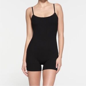 SKIMS Soft Lounge Lace Scoop Onesie | Onyx